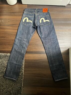 Evisu Men's Dark Indigo Jeans with Cream Pocket Appliqué